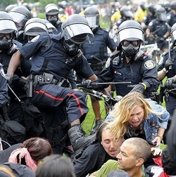 G20-Toronto-Police-Kicking-Unarmed-and-Tied-Up-Civilians (42K)